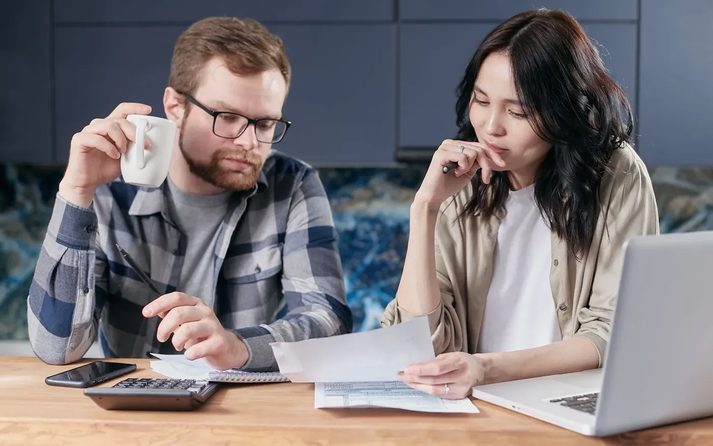 Couple comparing two life insurance options